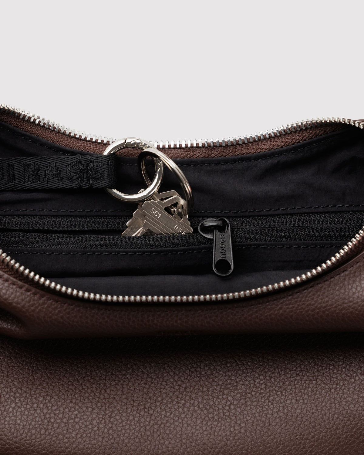 SMALL RECYCLED LEATHER FLAT CRESCENT - US 9117